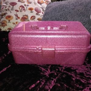 Isaac Jacobs glittery pink makeup storage box.